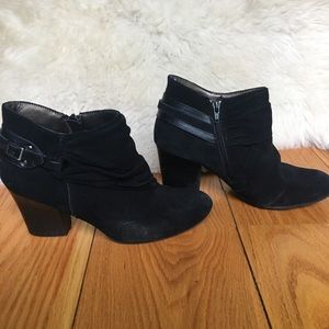 Black suede booties with strap details